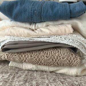 Stack of Designer Clothes